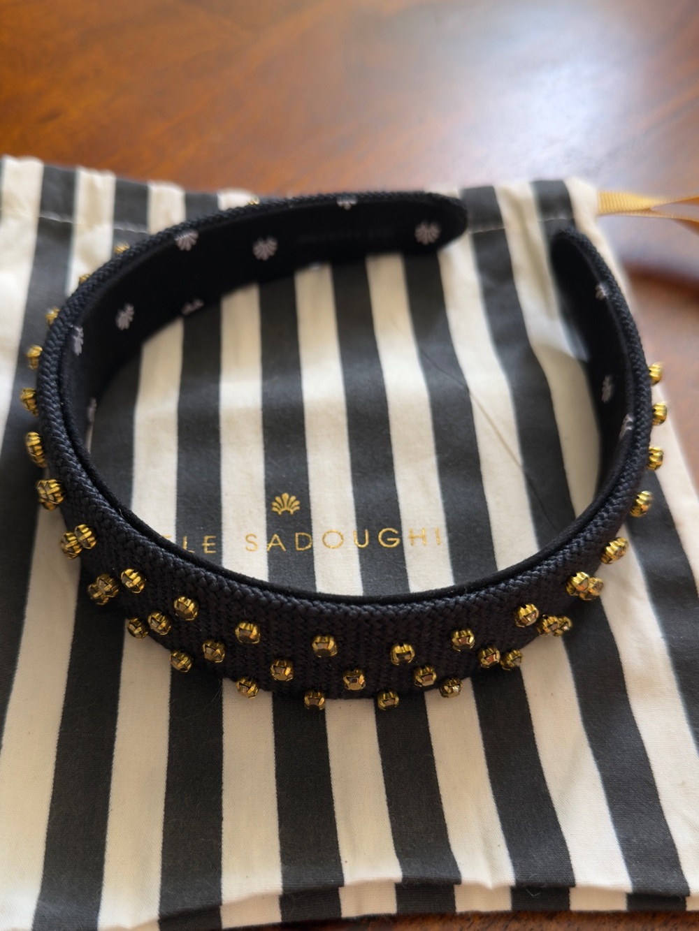 Lele Sadoughi Black Headband with Gold Embellishments